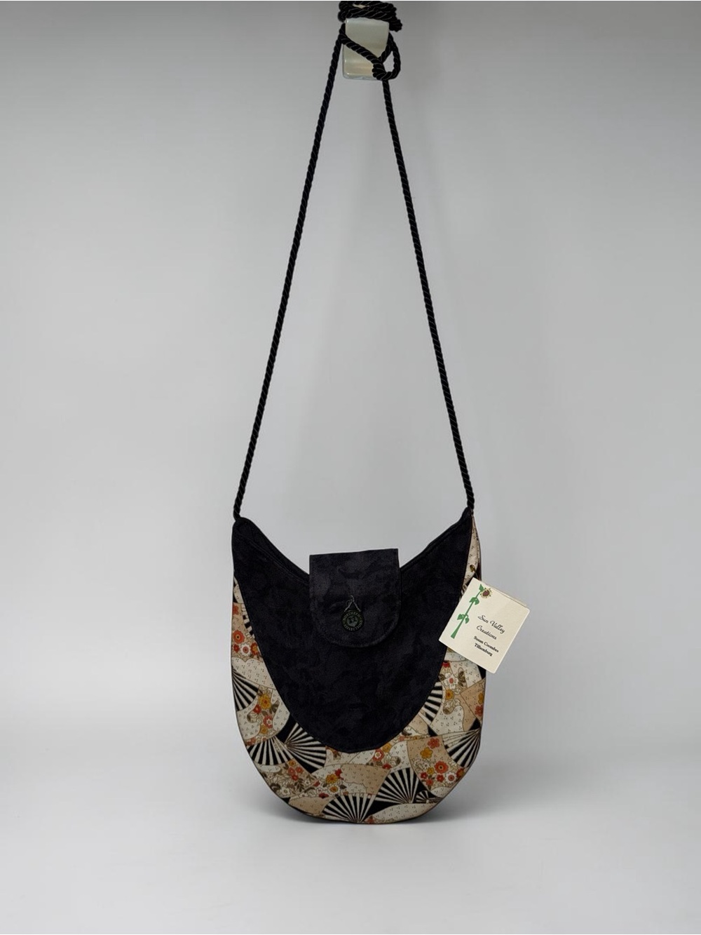 Black and Beige Patterned Crescent Crossbody Bag with Braided Strap